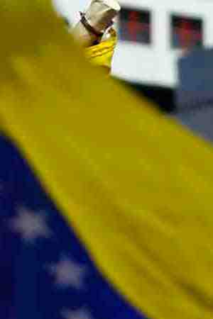 A man shouts during a rally against the government of Nicolás Maduro in the streets of Caracas on February 2, 2019 in Caracas, Venezuela. Venezuela's self-declared president and accepted by over 20 countries, Juan Guaido, called Venezuelans to the streets and demands the resignation of Nicolás Maduro. Photo by Marco Bello/Getty Images