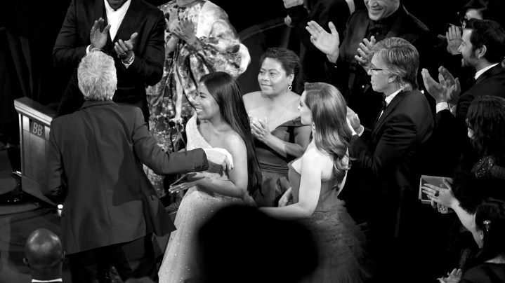 Alfonso Cuaron and Yalitza Aparicio react after Mr. Cuaron was announced as winner of the Cinematography award for 'Roma' onstage during the 91st Annual Academy Awards at Dolby Theatre on February 24, 2019 in Hollywood, California. Photo by Kevin Winter/Getty Images