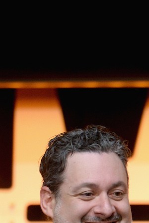 Dave Filoni and Pedro Pascal onstage during "The Mandalorian" panel at the Star Wars Celebration on April 14, 2019 in Chicago, Illinois. Photo by Daniel Boczarski/WireImage for Disney