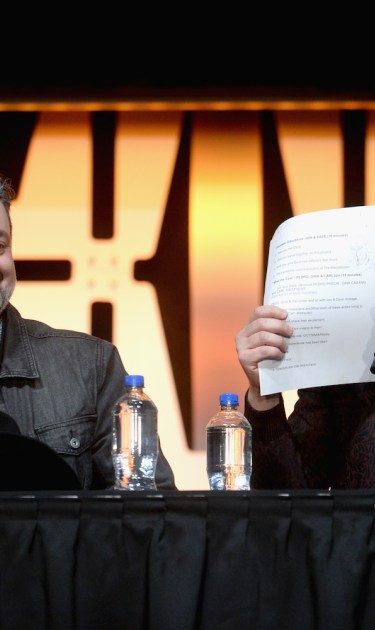 Dave Filoni and Pedro Pascal onstage during "The Mandalorian" panel at the Star Wars Celebration on April 14, 2019 in Chicago, Illinois. Photo by Daniel Boczarski/WireImage for Disney