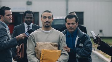 Freddy Miyares and John Leguizamo in 'When They See Us.' Courtesy of Netflix