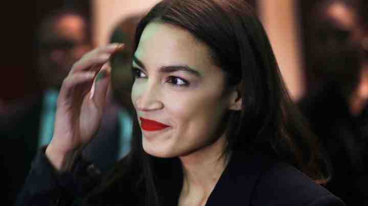 U.S. Rep. Alexandria Ocasio-Cortez (D-NY) prepares to speak at the National Action Network's annual convention on April 5, 2019 in New York City. Photo by Spencer Platt/Getty Images
