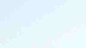 A man walks along the Mexican side of the U.S.-Mexico border barrier on April 2, 2019 in Tijuana, Mexico. Photo by Mario Tama/Getty Images