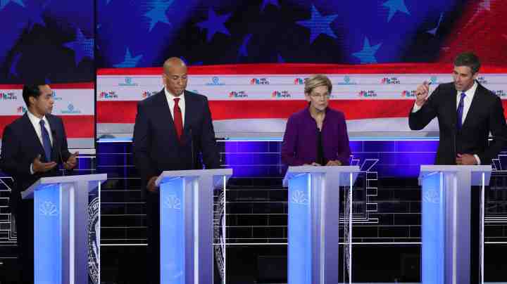 Julian Castro, Sen. Cory Booker and Sen. Elizabeth Warren and Beto O'Rourke speaks during the first night of the Democratic presidential debate on June 26, 2019 in Miami, Florida. Photo by Joe Raedle/Getty Images