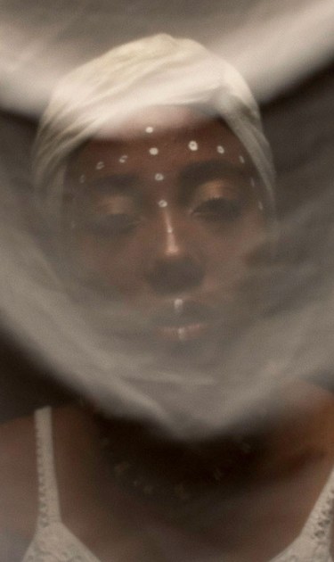 Karen Villalba, 23 years old. Anthropologist student, black woman activist part of Addis Abeba is representing Elegua, one of principal orishas of black Culture. Quito, 2018. Photo by Johis Alarcón