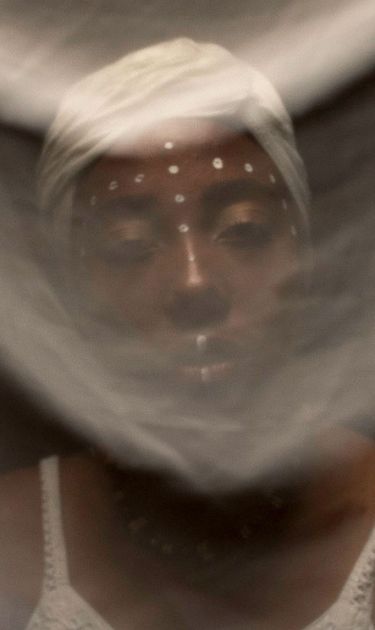 Karen Villalba, 23 years old. Anthropologist student, black woman activist part of Addis Abeba is representing Elegua, one of principal orishas of black Culture. Quito, 2018. Photo by Johis Alarcón