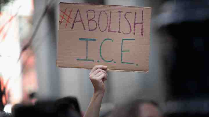 Demonstrators march through downtown calling for the abolition of the U.S. Immigration and Customs Enforcement (ICE) on August 16, 2018 in Chicago, Illinois. The demonstrators were also calling for defunding local police. Photo by Scott Olson/Getty Images