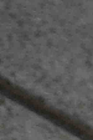 Razor wire is seen on the Metropolitan Detention Center prison as mass arrests by federal immigration authorities, as ordered by the Trump administration, were supposed to begin in major cities across the nation on July 14, 2019 in Los Angeles, California. Photo by David McNew/Getty Images