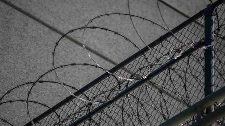 Razor wire is seen on the Metropolitan Detention Center prison as mass arrests by federal immigration authorities, as ordered by the Trump administration, were supposed to begin in major cities across the nation on July 14, 2019 in Los Angeles, California. Photo by David McNew/Getty Images