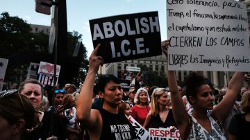 Hundreds of people gather in lower Manhattan for a "Lights for Liberty" protest against migrant detention camps and the impending raids by Immigration and Customs Enforcement (ICE) this coming weekend in various cities on July 12, 2019 in New York City. Photo by Spencer Platt/Getty Images