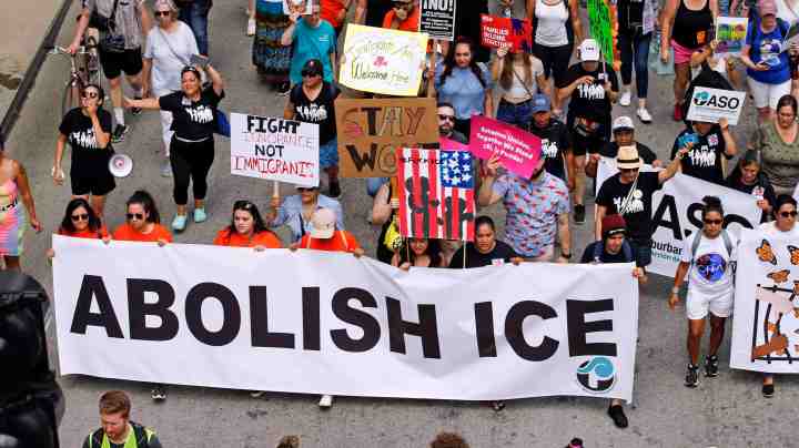 Protesters march to offices of the U.S. Immigration and Customs Enforcement on July 13, 2019 in Chicago, Illinois. The rally is calling for an end to criminalization, detention and deportation of migrants ahead of planned ICE raids expected to begin tomorrow. Photo by Nuccio DiNuzzo/Getty Images