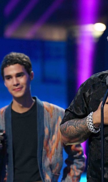 Daddy Yankee accepts an award on stage during Premios Juventud 2019 at Watsco Center on July 18, 2019 in Coral Gables, Florida. Photo by Jason Koerner/Getty Images