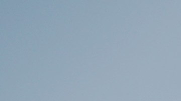 Protestors gather before a candlelight vigil outside City Hall, while demanding the resignation of Ricardo Rossello, the Governor of Puerto Rico, on July 22, 2019 in Los Angeles, California. Photo by Mario Tama/Getty Images