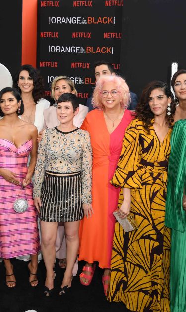 Selenis Leyva, Danielle Brooks, Diane Guerrero, Beth Dover, Jason Biggs, Jackie Cruz, Uzo Aduba, Alysia Reiner, Natasha Lyonne, Jessica Pimentel, Taylor Schilling, Laura Prepon, and Laverne Cox attend 'Orange Is The New Black' Final Season Premiere at Alice Tully Hall on July 25, 2019 in New York. Photo by Dimitrios Kambouris/Getty Images