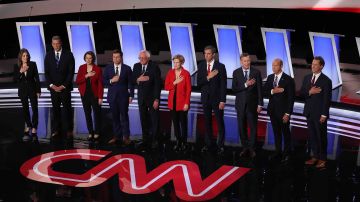 Democratic presidential candidates Marianne Williamson, (L-R), Rep. Tim Ryan (D-OH), Sen. Amy Klobuchar (D-MN), Indiana Mayor Pete Buttigieg, Sen. Bernie Sanders (I-VT), Sen. Elizabeth Warren (D-MA), former Texas congressman Beto O'Rourke, former Colorado governor John Hickenlooper, former Maryland congressman John Delaney, and Montana Gov. Steve Bullock
take the stage at the beginning of the Democratic Presidential Debate at the Fox Theatre July 30, 2019 in Detroit, Michigan. Photo by Justin Sullivan/Getty Images