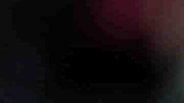 State Rep. Joaquin Castro(R) waves with his brother San Antonio Mayor Julian Castro during day one of the Democratic National Convention at Time Warner Cable Arena. Photo by Justin Sullivan/Getty Images