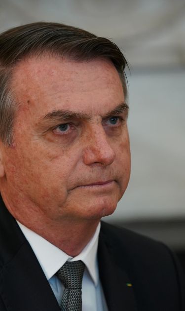 Brazilian President Jair Bolsonaro attends a meeting with U.S. President Donald Trump at the White House March 19, 2019 in Washington, DC. Photo by Chris Kleponis-Pool/Getty Images