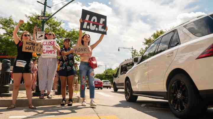 People hold up signs protesting against the U.S. Immigration and Customs Enforcement agency on August 10, 2019 in New York City. Photo by David Dee Delgado/Getty Images