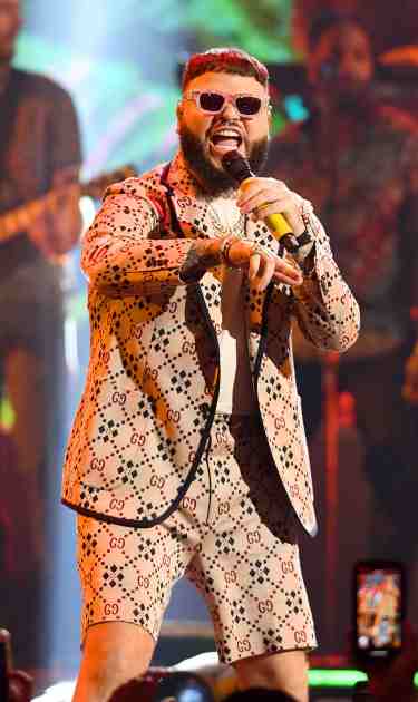 Farruko performs on stage during Premios Juventud 2019 at Watsco Center on July 18, 2019 in Coral Gables, Florida. Photo by Jason Koerner/Getty Images