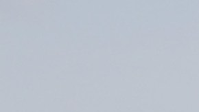 The Mexican and U.S. flags fly at a makeshift memorial honoring victims outside Walmart, near the scene of a mass shooting which left at least 22 dead. (Photo by Mario Tama/Getty Images)