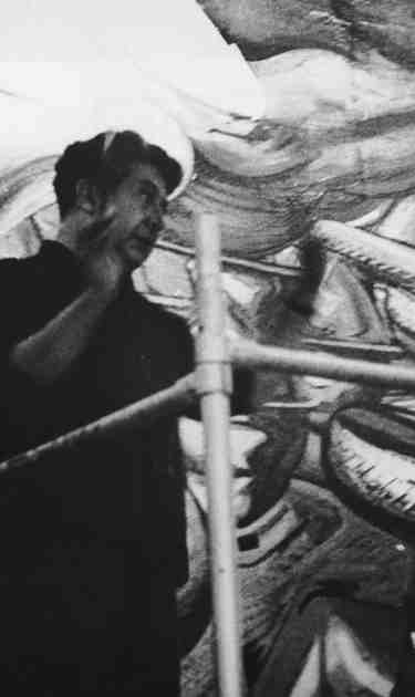 David Alfaro Siqueiros working on a mural in the Hall of the Revolution in Chapultepec Castle, circa 1960. Photo by Keystone/Hulton Archive/Getty Images