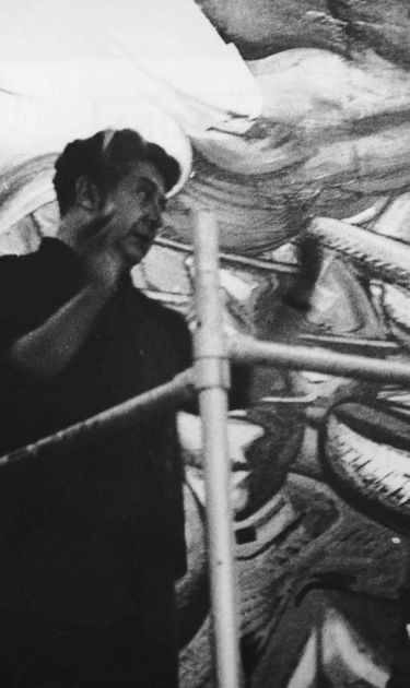 David Alfaro Siqueiros working on a mural in the Hall of the Revolution in Chapultepec Castle, circa 1960. Photo by Keystone/Hulton Archive/Getty Images