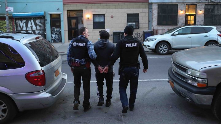 U.S. Immigration and Customs Enforcement (ICE), officers arrest an undocumented Mexican immigrant during a raid in the Bushwick neighborhood of Brooklyn on April 11, 2018 in New York City. Photo by John Moore/Getty Images
