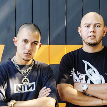 Producer Tainy and music executive Lex Borrero outside Neon 16 in Miami, FL. Photo by Alfonso Duran for Remezcla