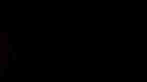 A detail of a New England Patriots player raising the Vince Lombardi Trophy at the Super Bowl