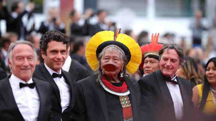 Chief Raoni Metuktire, Jean-Pierre Dutilleux and guests attend the screening of "Sibyl" during the 72nd annual Cannes Film Festival on May 24, 2019 in Cannes, France. Photo by Andreas Rentz/Getty Images