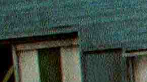 A young Cuban walks home after purchasing bread November 3, 2001 in Havana, Cuba. Photo by Jorge Rey/Getty Images