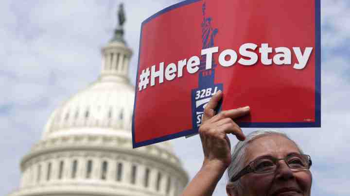 An activist holds sign as she participates in a news conference on immigration September 9, 2019 on the ground of the U.S. Capitol in Washington, DC. Photo by Alex Wong/Getty Images