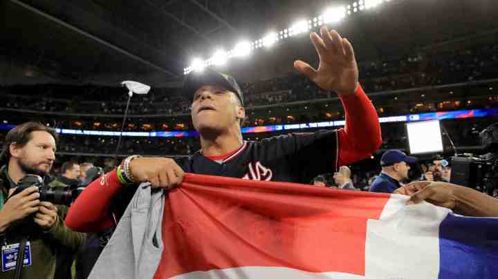 Juan Soto of the Washington Nationals celebrates after defeating the Houston Astros in Game Seven to win the 2019 World Series at Minute Maid Park on October 30, 2019 in Houston, Texas. Photo by Mike Ehrmann/Getty Images