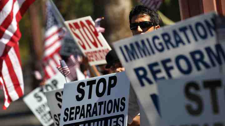 Demonstrators protest Arizona's new immigration enforcement law at a demonstration at the state capitol building on May 1, 2010 in Phoenix, Arizona. Photo by John Moore/Getty Images