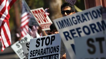 Demonstrators protest Arizona's new immigration enforcement law at a demonstration at the state capitol building on May 1, 2010 in Phoenix, Arizona. Photo by John Moore/Getty Images