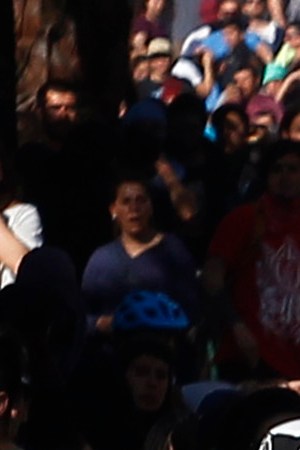 Anti-government demonstrators clash with police as they protest against cost of living increases on October 20, 2019 in Santiago, Chile. Photo by Marcelo Hernandez/Getty Images