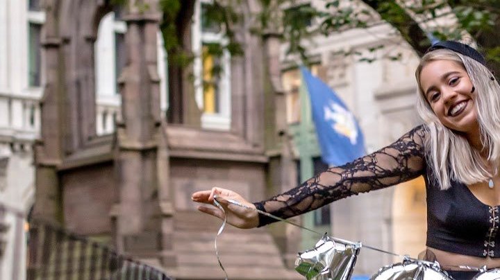 Mandy Velez celebrates paying off her student loan debt with a photoshoot at a New York cemetery. Photo by Mike Arrison