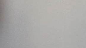 Immigrants wait to eat at a temporary migrant shelter set up near the U.S.-Mexico border on November 18, 2018 in Tijuana, Mexico. Photo by John Moore/Getty Images