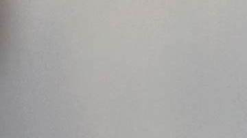 Immigrants wait to eat at a temporary migrant shelter set up near the U.S.-Mexico border on November 18, 2018 in Tijuana, Mexico. Photo by John Moore/Getty Images