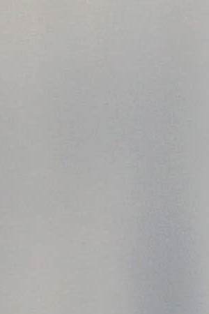 Immigrants wait to eat at a temporary migrant shelter set up near the U.S.-Mexico border on November 18, 2018 in Tijuana, Mexico. Photo by John Moore/Getty Images