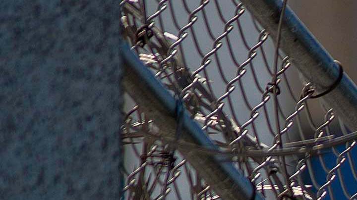 Razor wire is seen on the Metropolitan Detention Center prison as mass arrests by federal immigration authorities, ordered by the Trump administration, were supposed to begin in major cities across the nation on July 14, 2019 in California. Photo by David McNew/Getty Images