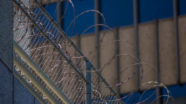 Razor wire is seen on the Metropolitan Detention Center prison as mass arrests by federal immigration authorities, ordered by the Trump administration, were supposed to begin in major cities across the nation on July 14, 2019 in California. Photo by David McNew/Getty Images