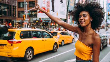Women hailing a ride in New York City. Photo by 
Fabio Formaggio / Getty Images