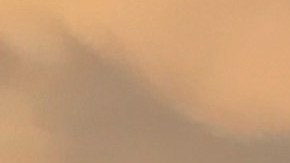 A U.S. Border Patrol agent watches over the U.S.-Mexico border at dusk on July 22, 2018 in Nogales, Arizona. Photo by John Moore/Getty Images