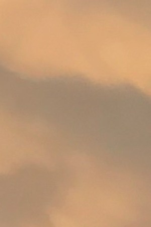 A U.S. Border Patrol agent watches over the U.S.-Mexico border at dusk on July 22, 2018 in Nogales, Arizona. Photo by John Moore/Getty Images