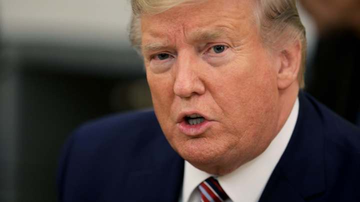 U.S. President Donald Trump talks to reporters in the Oval Office at the White House on November 25, 2019 in Washington, DC. Photo by Chip Somodevilla/Getty Images