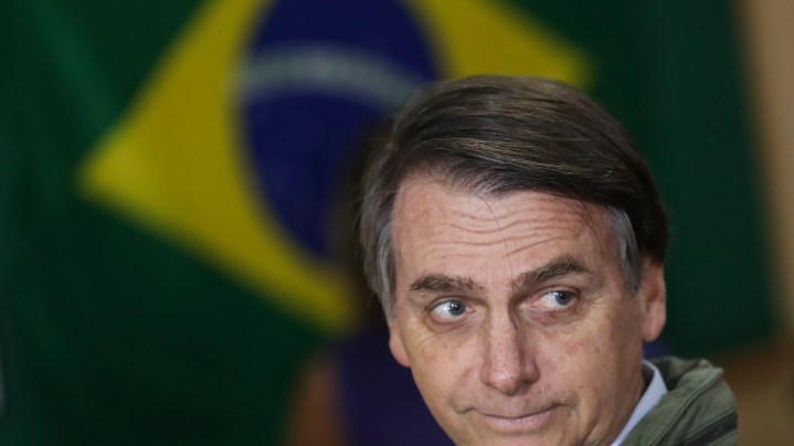Brazilian President Jair Bolsonaro calls Swedish climate change activist Greta Thunberg a brat. Photo by Ricardo Moraes-Pool/Getty Images)