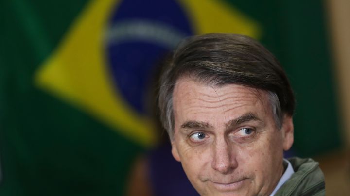 Brazilian President Jair Bolsonaro calls Swedish climate change activist Greta Thunberg a brat. Photo by Ricardo Moraes-Pool/Getty Images)