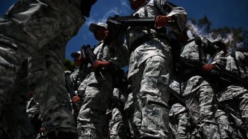 Elements of the National Guard march during the ceremony of deployment of the new Mexican security force 'National Guard' at Campo Marte on June 30, 2019 in Mexico City, Mexico. Photo by Manuel Velasquez/Getty Images