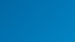 Midair military cargo C-130 plane in mid flight. Photo by Jeff Manes / iStock / Getty Images Plus